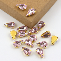 Kaboszon w oprawie łezka fasetowana lilaróż 13x8mm