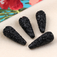 Rzeźbiona kropla czarna 28x11mm