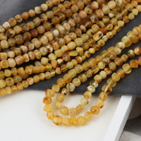 Bursztyn bryłka 6mm [sznur 39cm]