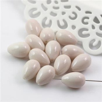 Koralik szklany kropla ecru 13x9mm