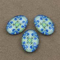 Kaboszon szklany z grafiką owal 18x13mm