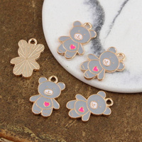 Zawieszka złota emaliowana szary miś z sercem 20x13mm