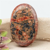 Kaboszon owal jaspis leopardzi 30x20x7mm
