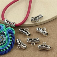 Krawatka metalowa ażurowa srebrna 14x9mm