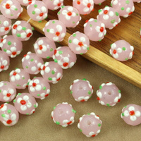 Koralik szklany w kwiatki różowy 13x12mm