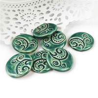 Kaboszon ceramiczny moneta lilia zielona 24mm