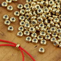 Stoper blokada z silikonem metalowa złota 5x2,5mm/1,0