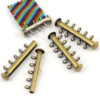 Zapięcie wsuwane mosiężne na 5 sznury [lupik w pionie]