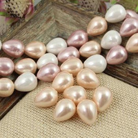 Perła seashell kropla kremowa 15x12mm