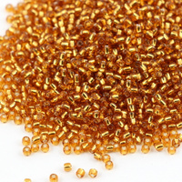 Toho Round 15/0 Silver-Lined Topaz [5g]