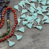 Mini chwost ze srebrnym ogniwem i tulejką miętowy 12x2mm [4szt]