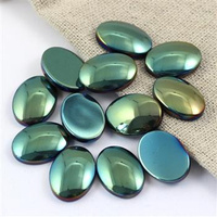 Kaboszon hematyt owal zielony 16x12mm