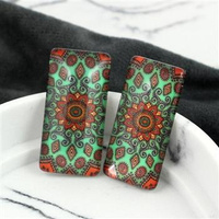 Kaboszon szklany z grafiką ornament pomarańczowy 38x19mm