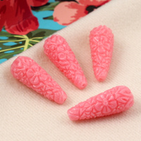 Rzeźbiona kropla koralowa 28x11mm