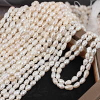 Perła słodkowodna biała oliwka 7x4mm [sznur 35cm]