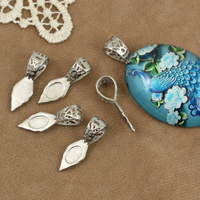 Krawatka do naklejania srebrna 25x8mm