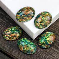 Kaboszon akrylowy owal aurora borealis green 40x30mm