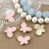 Zawieszka emaliowany motyl różowy 17x13mm