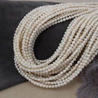 Perła słodkowodna milky kula 4mm [sznur 37cm]