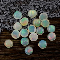 Kaboszon okrągły opal etiopski 6mm