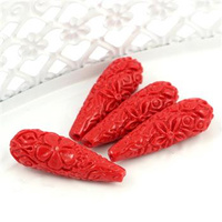 Rzeźbiona kropla czerwona 34x11mm