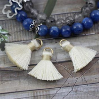 Chwost wiskozowy kremowy z ogniwem 20x6mm