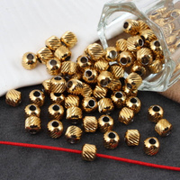 Przekładka kula fakturowana stal szlachetna pozłacana 5mm