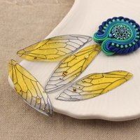 Akrylowa zawieszka skrzydło ważki żółte 51x16mm