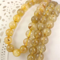 Kwarc ze złotym rutylem kula 11mm