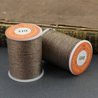 Sznurek nylonowy METALLIC BLACK GOLD 1mm [szpula 7m]