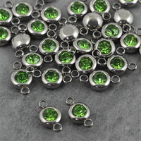 Stal szlachetna łącznik w oprawie SR olivine 6mm