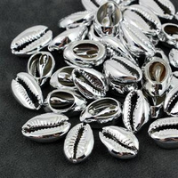 Muszelki kauri porcelanka 18-20mm silver [1szt]