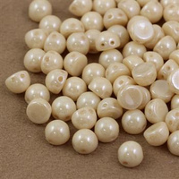 CzechMates Cabochon 7mm Opaque Luster Champagne [10szt]
