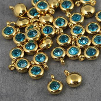 Stal szlachetna zawieszka w oprawie ZŁ aquamarine 6mm