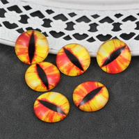 Kaboszon szklany z grafiką oko moneta pomarańczowa 20mm