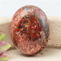 Kaboszon owal jaspis leopardzi 26x20x8mm