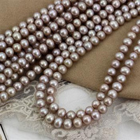 Perła słodkowodna złoto-beżowa kula 7mm