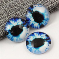 Kaboszon szklany z grafiką oko moneta niebieska 20mm