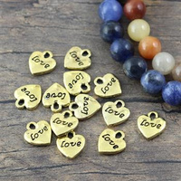 Zawieszka metalowa serce złote Love 11x10mm