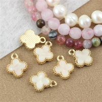 Zawieszka złota kwiatek z kremową emalią 14x11mm