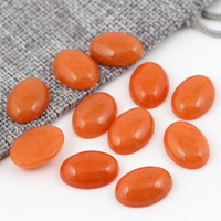 Kaboszon jadeit pomarańczowy owal 18x13mm