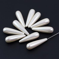 Perła seashell kropla biała wiercona do połowy HQ 30x8mm