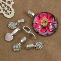 Krawatka do naklejania srebrna 21x10mm