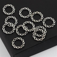 Metalowe kółko skręcane srebrne 15mm 