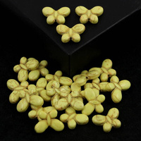 Howlit żółty motyl 20x15mm