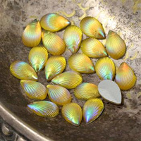 Kaboszon akrylowy łezka muszla żółta AB 12x8mm 