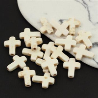 Howlit marmurkowy krzyżyk 16x12mm