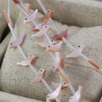 Muszla perłowa ptaszek 15x6mm