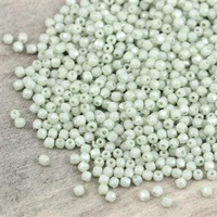 Fire Polish 2mm Opaque Light Green Ceramic Look [80szt]