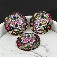 Kaboszon szklany z grafiką moneta czaszka 25mm